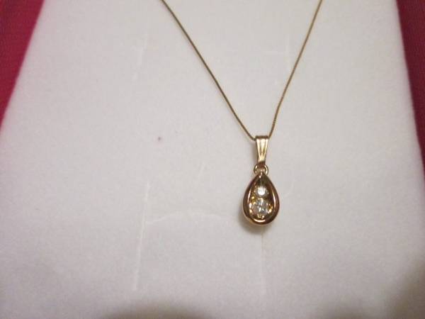 Photo 10k yellow gold tear drop shaped 2 diamonds necklace $175