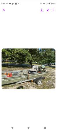 Photo 12 ft Jon boat and trailer $1,300