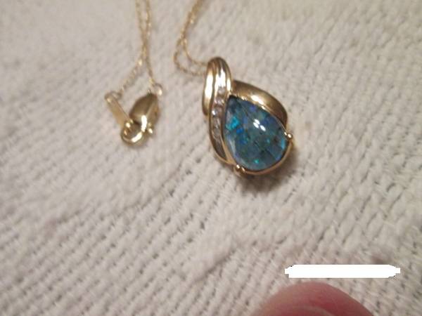 Photo 14k yellow gold tear drop shaped mosaic opal necklace $180