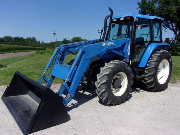 Photo New Holland TS100 4wd Tractor w Cab  Loader $39,500