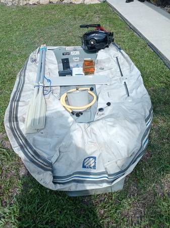 Photo Inflatable Boat with Outboard $740