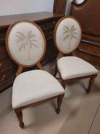 Photo TOMMY BAHAMA BRAND Palm motif chairs $800