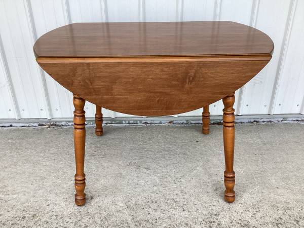 Photo Vintage Smaller Round Table with Leaves that fold down $60