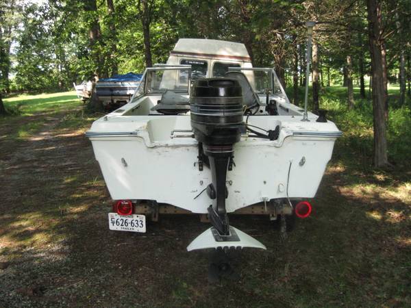 Thirty five hp Mercury outboard with boat and trailer $2,000