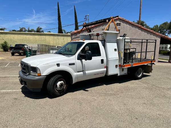 Photo 2002 Ford F350 Diesel 7.3L Dually Flatbed Dump Truck $14,900