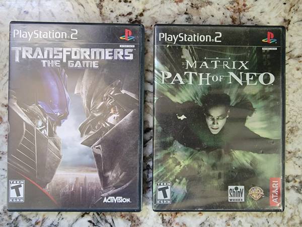 Photo 2 PS2 Video Games Transformers and Matrix $15