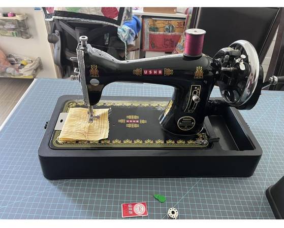 Photo Hand Crank Sewing Machine $150