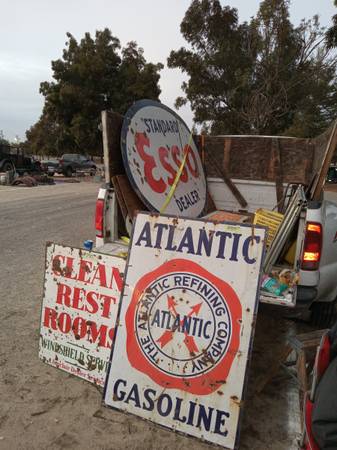 Looking to buy porcelain signs and vintage tin signs $1