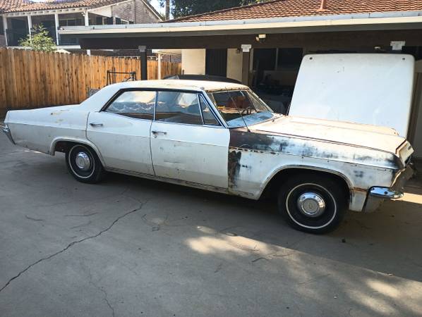 selling my 1965 4 door Impala runs great 283 mortor $9,000