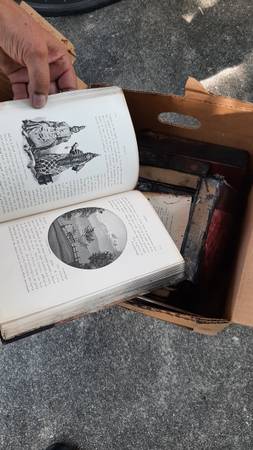 Photo Antique books from house fire - free