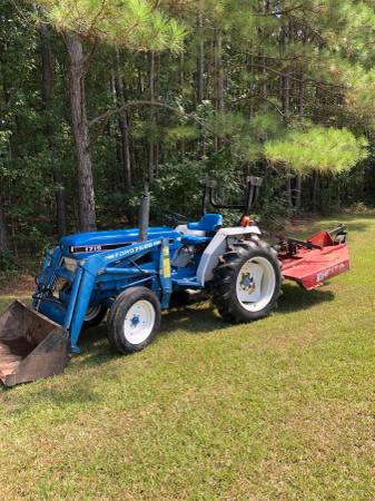 Photo 1997 Ford New Holland 1715 Tractor $14,000