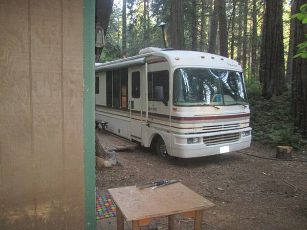 36 FOOT RV IN THE WOODS $950