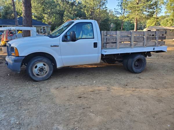Photo Ford F350 w Flatbed, dually - $8,000 (Garden Valley)