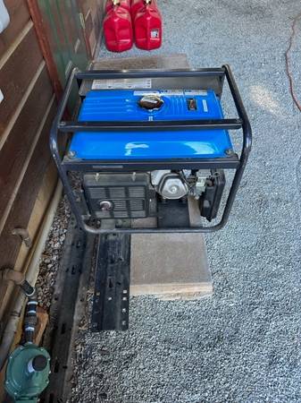 Photo Portable Generator- Powered by HONDA $550