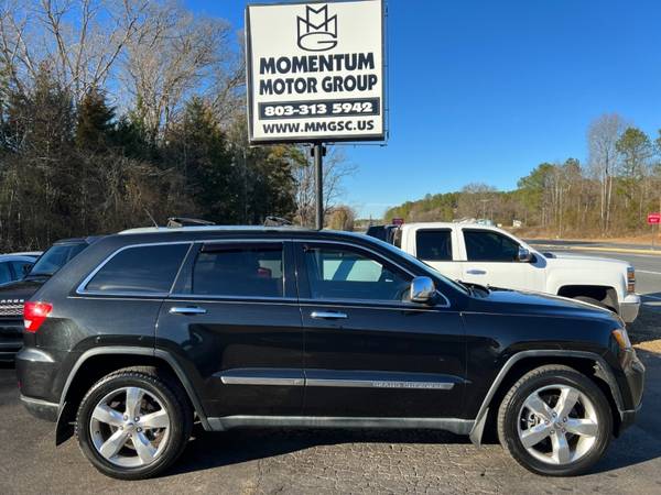 Photo 2011 Jeep Grand Cherokee 4WD 4dr Overland Summit - $14,995 (2011 Jeep Grand Cherokee 4WD 4dr Overland)