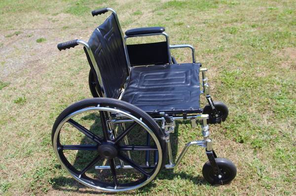 Photo 22 Inch XL Wheelchair No foot rests. WIDE for heavy person. $120