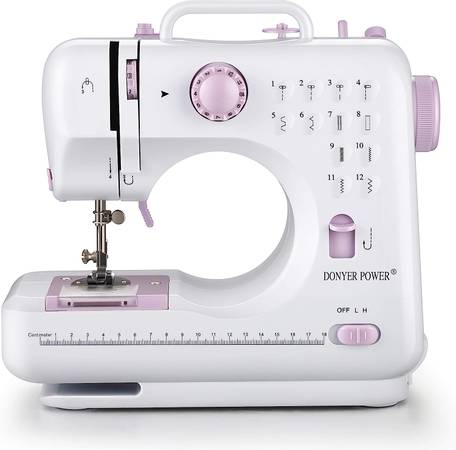 Photo NEW Mini Sewing Machine $50