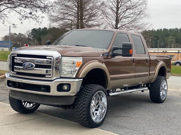 Photo Lifted 11 Ford F-250 lariat 4x4 on 24s clean southern title truck  - $34,900 (Easley)
