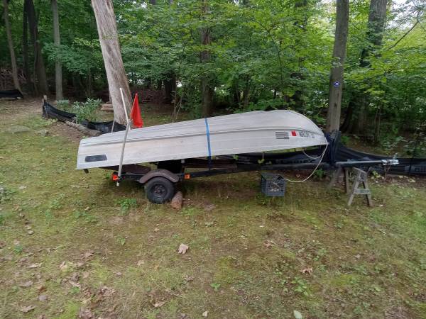 12 ft aluminum boat with trailer and extras $1,000