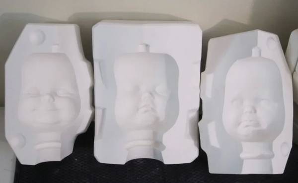 Photo porcelain doll molds for sale $1,000