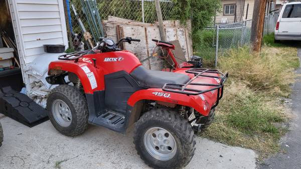 Photo Three Artic Cat 4 wheelers for sale. $15,500