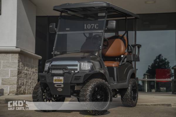 Photo 2017 Black and Brown Club Car Alpha 48 Volt 4 Seater Lifted Golf Cart