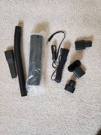 Photo Cordless Vacuum Cleaner Handheld Portable, NEW $8