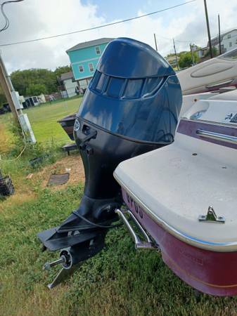 Photo EVINRUDEBOMBARDIER 150HP OUTBOARD FUEL INJECTION LOW HOURS $1,299