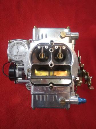 Photo holley carburetor parts and sevice $1