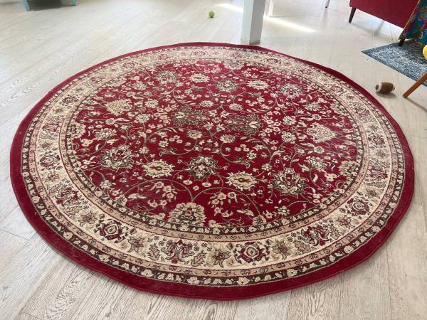 Photo Oriental Patterned 8 foot round Rug in great condition with non slip mat. $60