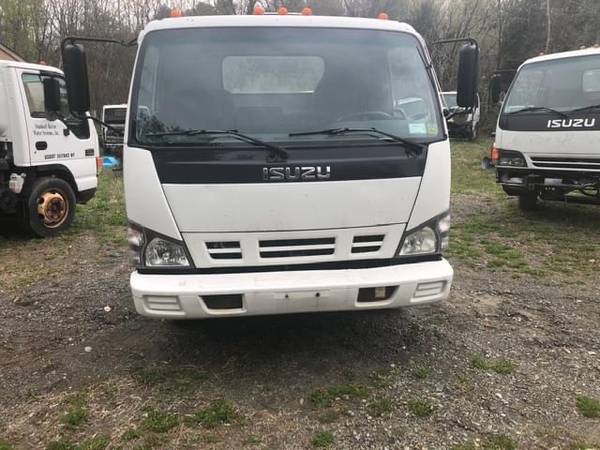 Photo Parting out ISUZU NPR NQR and GMC TRUCKS diesel AND gas