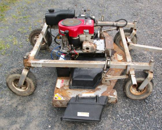 Photo Swisher 60 in tow behind Mower $1,300
