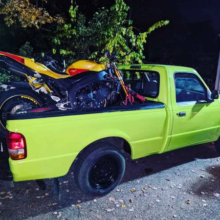 Photo tow of motorcycle or motor bike (scooter) $1