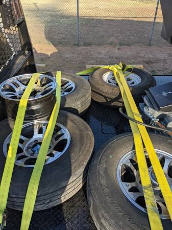 Photo Four (4) Six-Lug Alloy Trailer Wheels, Tires, and a Spare $400