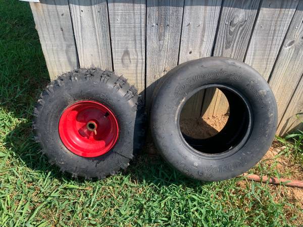 Photo shower pan, trex railing, lawnmower tire. $50