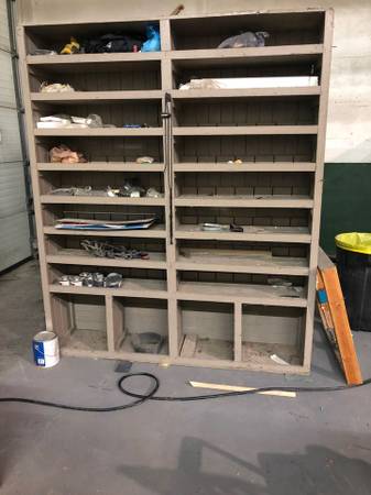 Parts bins, shelf, work bench, table, and small refrigerator $350