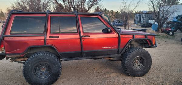 Photo 1999 Jeep Cherokee sport 4x4 trade - $10,000 (High Desert)
