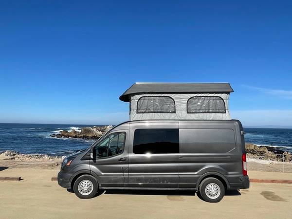Photo 2020 Ford transit 250 awd mid roof with pop top $70,000