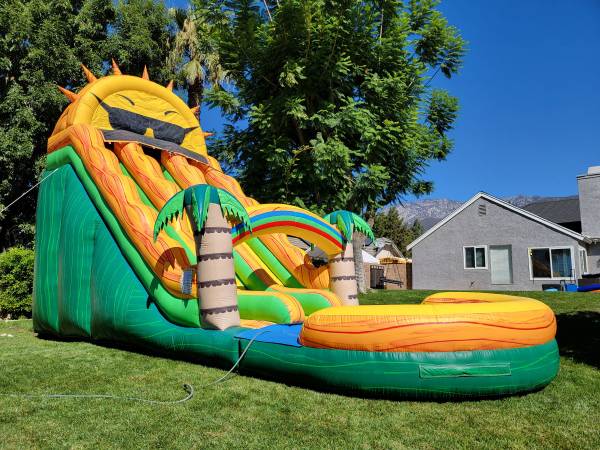 Photo 22 ft dual Lane inflatable water slide $2,400