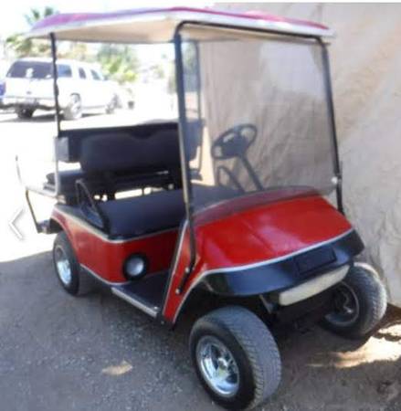 Photo 4 seater Ezgo golf cart. $4,300