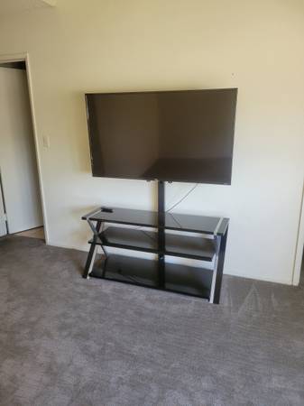 Selling my TV and TV stand $150
