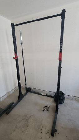 Photo Squat Rack with Bar and Plates $240