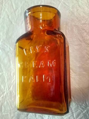 Photo VINTAGE Antique  ELYS CREAM BALM Amber Embossed Medicine Bottle $12