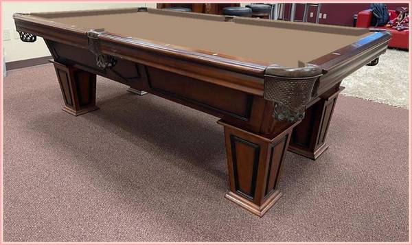 Photo priced to sell pool table by american heritage $2,200