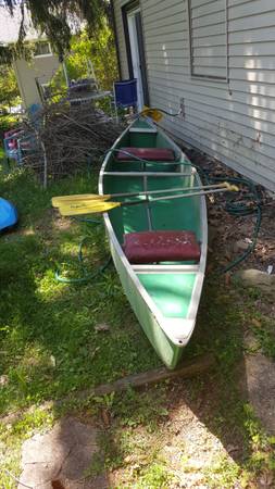Photo FOR SALE 16 Foot Aluminum Canoe with Paddles $300