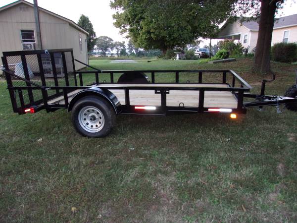 Photo single axle trailer 610x12 with tire mount  lift spring on load gat $1,900