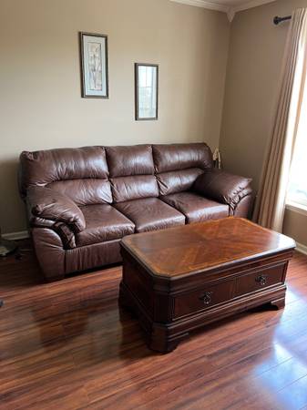 Photo Convertible love seat pull out full size bed $400
