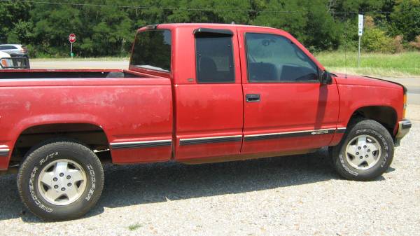 Photo 1997 Chevy truck xtra cab rebuilt title red - $3,988 (Harrisburg)