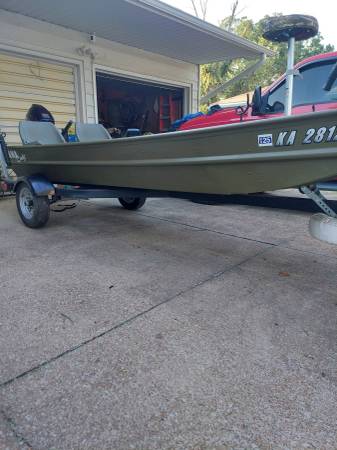 Alumacraft bass boat with trailer, 9.9 $4,500