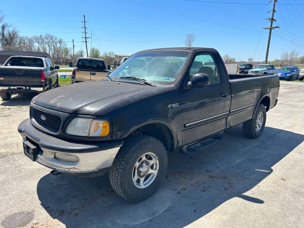 Photo 1997 FORD F-150 XLT - LONG BED  4.6 L 4X4 V8  WORK TRUCK $4,450